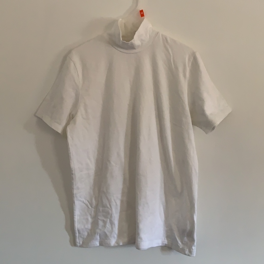 White turtle neck top